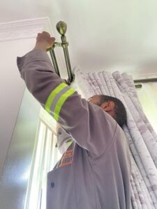 Helping our clients install their curtains
